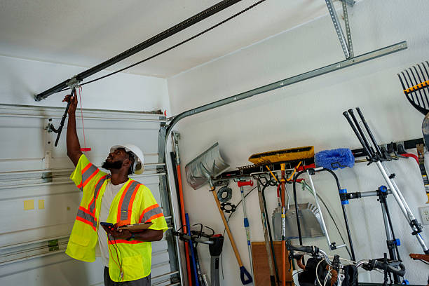 Professional Garage Door Roller Replacement technician working in North Plymouth, MA
